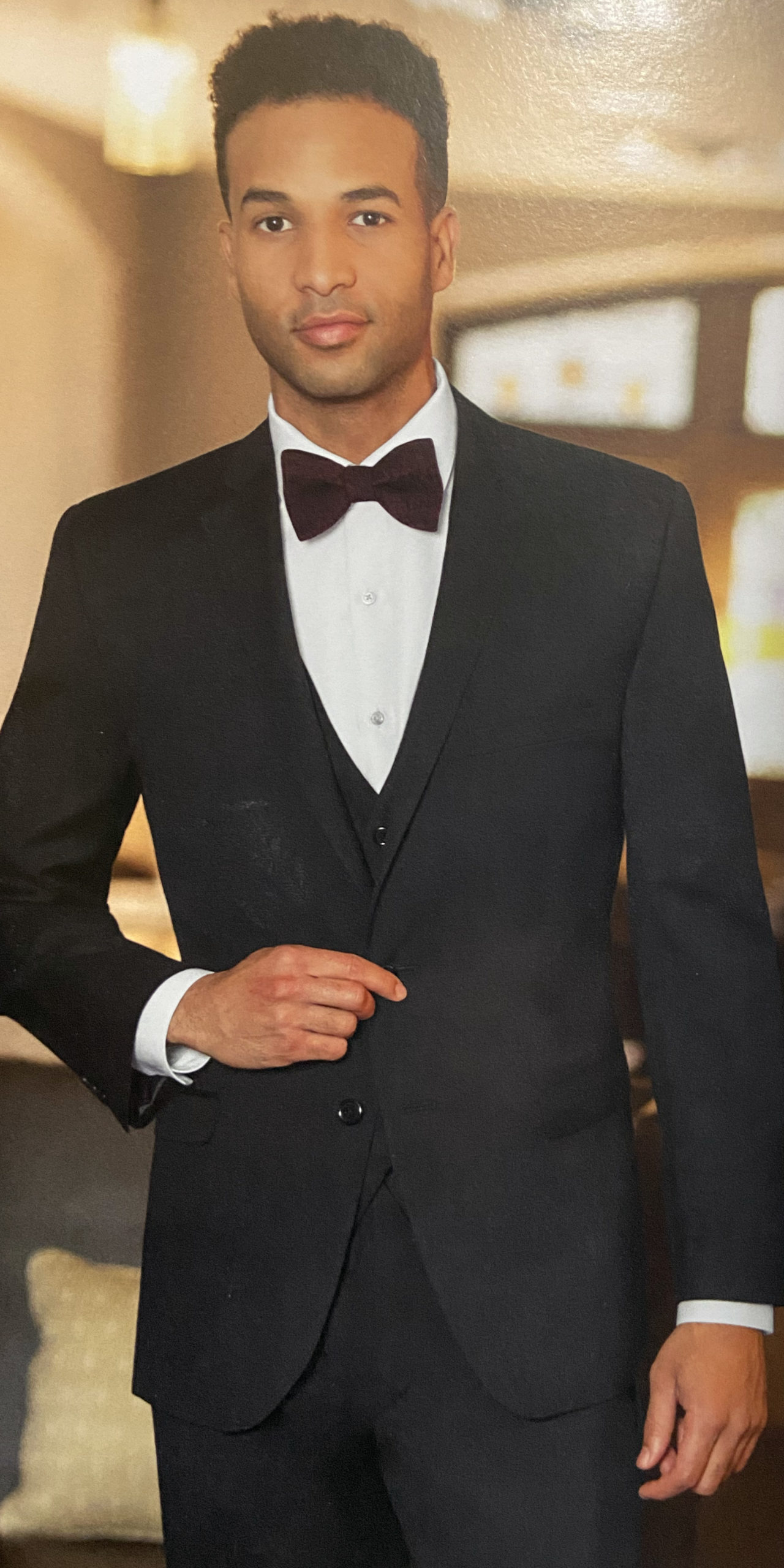 Jackson James Black Slim Fit Suit shown with a white microfiber shirt and  solid black tie.