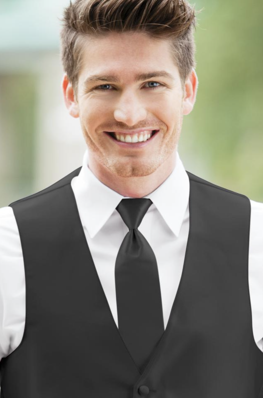 solid-black-tie Solid black windsor long Tie, shown with white shirt and black vest