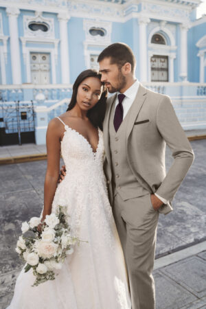 Allure Men's Tan and Sand colored Suit wearing a dark burgundy long tie.