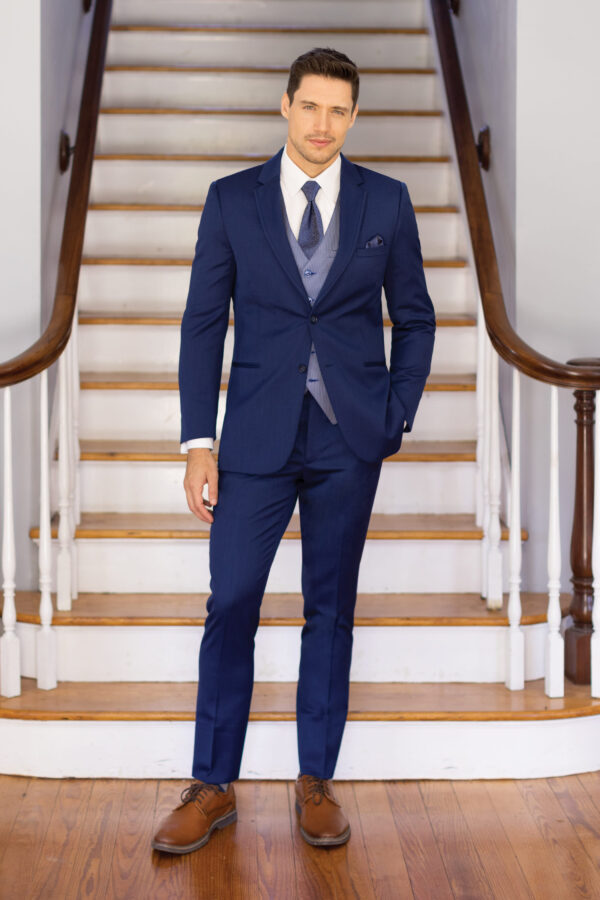 Performance Blue Suit with medium blue vest and dark Blue Tie