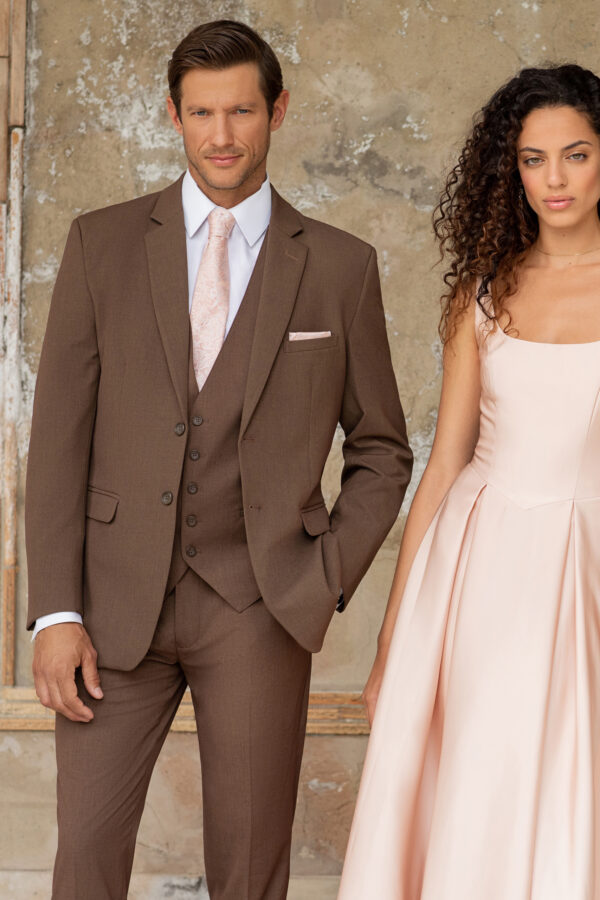 Metro cocoa color suit shown jacket, pants, vest, and a pink long tie